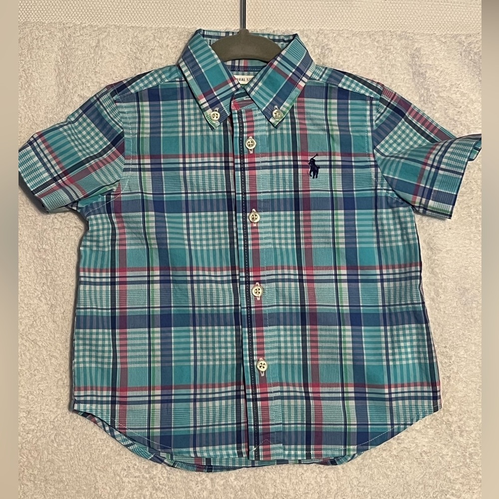 Boys short-sleeve, button down short in size 9M. Pastel colors.